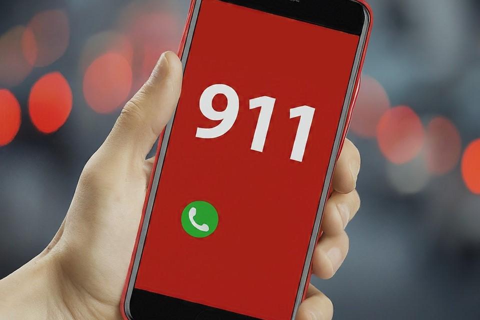 Image of phone with numbers 9-1-1 on screen